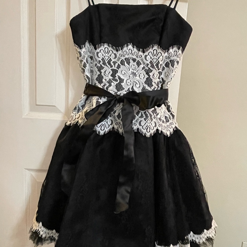 Black cocktail dress with beautiful detail by Jessica McClintock